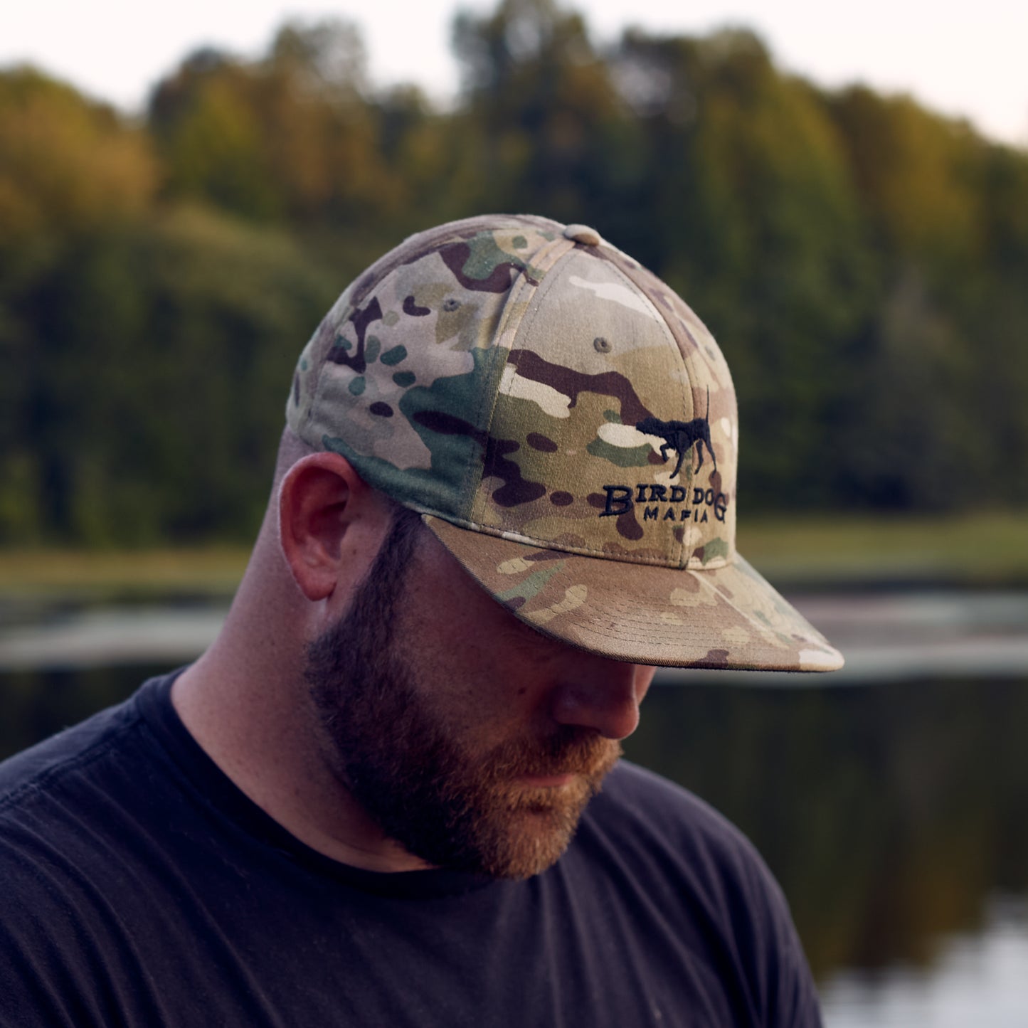 Man wearing a Camo Fitted Bird Dog Mafia™ Hat